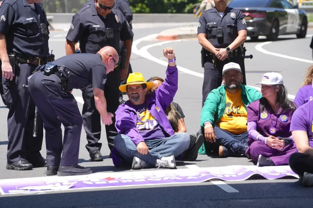 Arrest following act of civil disobedience at SEIU 721 march.