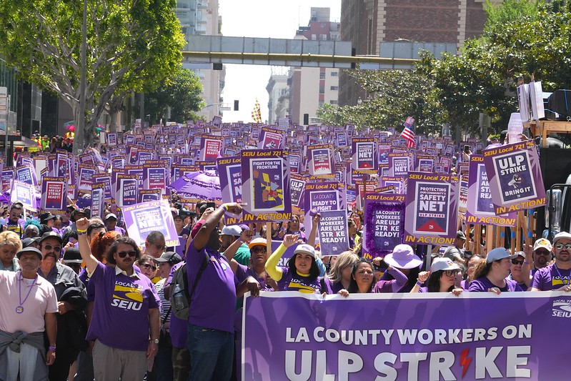 Striking LA County workers pack Figueroa St. in downtown Los Angeles.