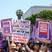 SEIU 721 marching and holding signs. One sign reads: LA County care for your community but not for your workers? Practice What You Preach.