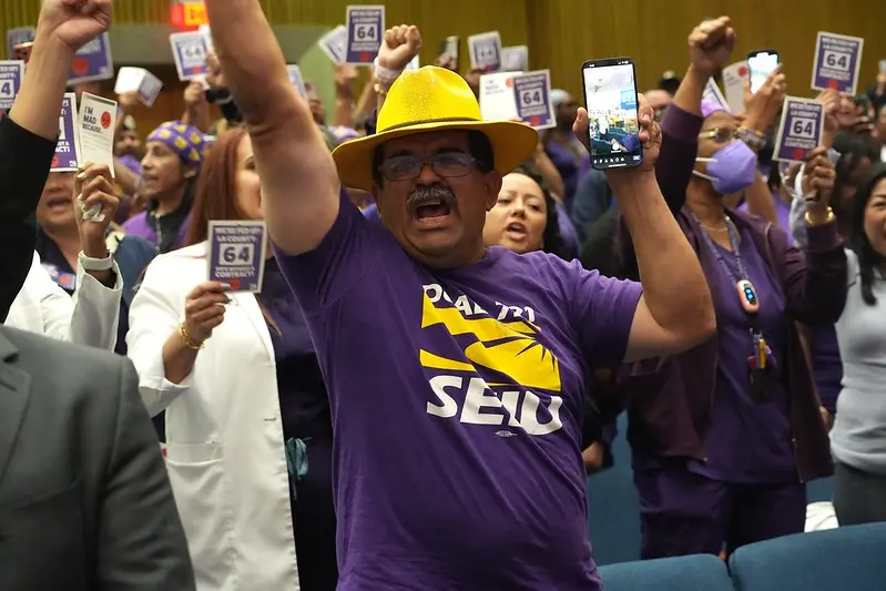 Union members express outrage with the Board of Supervisors.