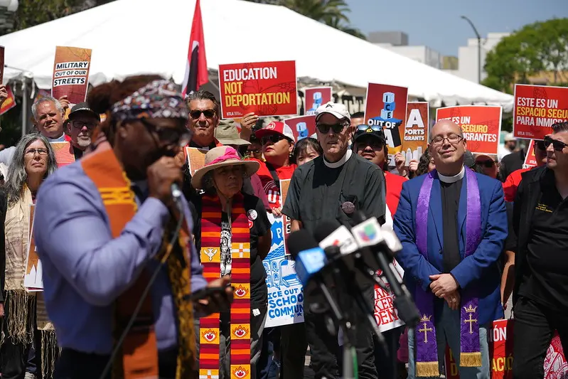Pastor Cue-Jn-Marie addresses attendees of the "Summer of Resistance" launch in downtown Los Angeles.